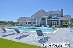 community pool with a patio