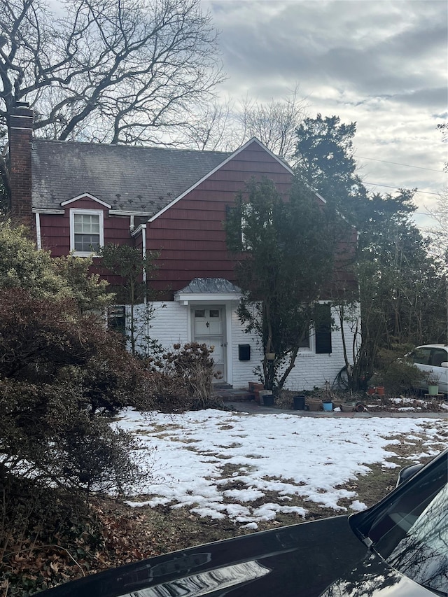 view of front of property with a chimney