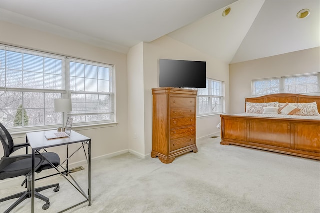 bedroom with baseboards, light carpet, and lofted ceiling