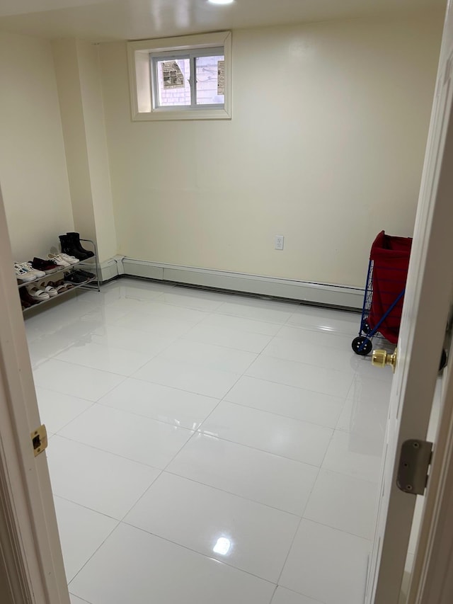 unfurnished room featuring light tile patterned floors