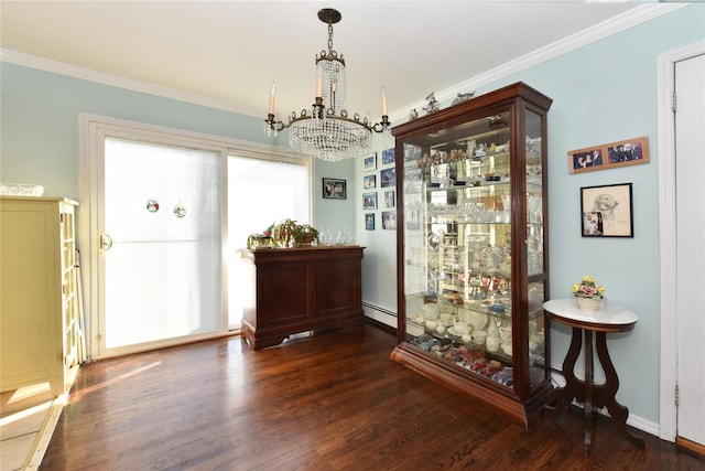 dining area with a notable chandelier, wood finished floors, and ornamental molding