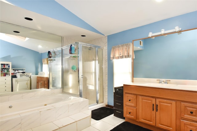 full bath featuring tile patterned flooring, a tub with jets, a stall shower, and lofted ceiling