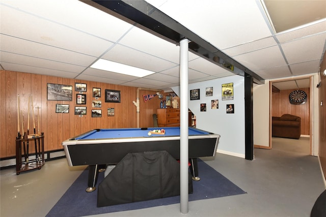 playroom with finished concrete floors, wood walls, billiards, and a paneled ceiling