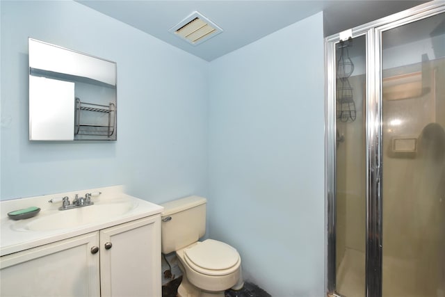 bathroom featuring visible vents, toilet, and a stall shower