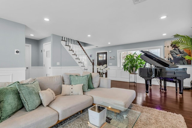 living room featuring stairway, recessed lighting, a wainscoted wall, and wood finished floors