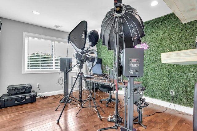 interior space with recessed lighting, visible vents, baseboards, and hardwood / wood-style floors