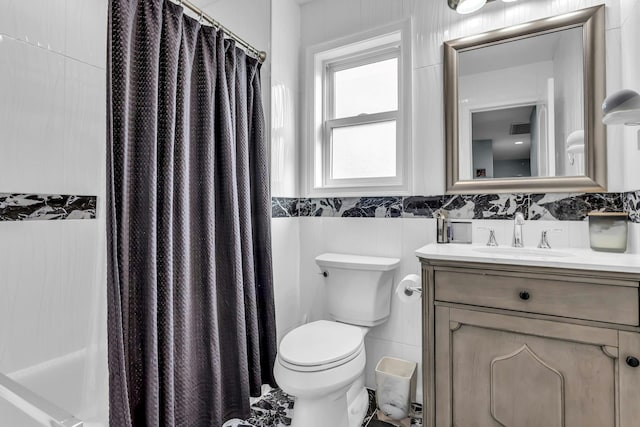 full bath with vanity, a shower with shower curtain, visible vents, tile walls, and toilet