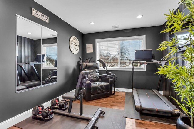 106 Hickory Ln, Levittown, NY 11756 - exercise room with recessed lighting, visible vents, baseboards, and wood finished floors