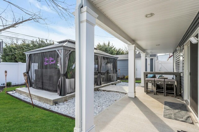 106 Hickory Ln, Levittown, NY 11756 - view of patio with a gazebo and fence
