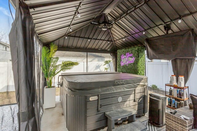 106 Hickory Ln, Levittown, NY 11756 - view of patio / terrace featuring fence and a hot tub
