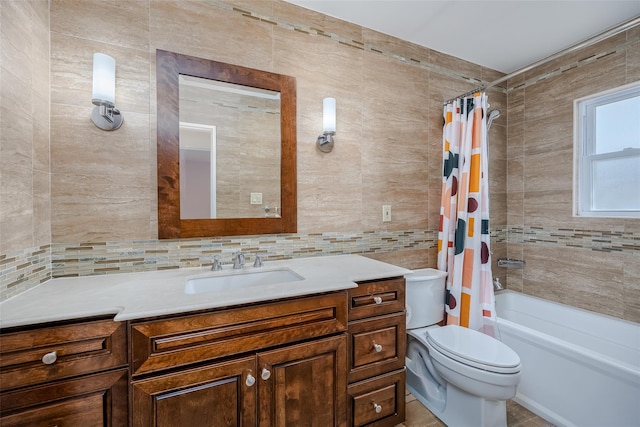 full bathroom with toilet, vanity, shower / bath combo, decorative backsplash, and tile walls