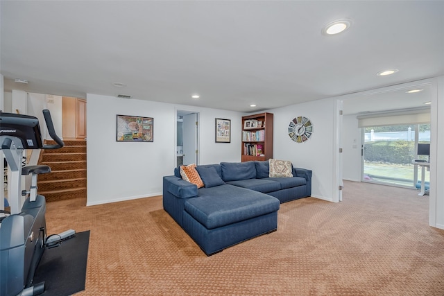 living room with baseboards, recessed lighting, visible vents, and light carpet