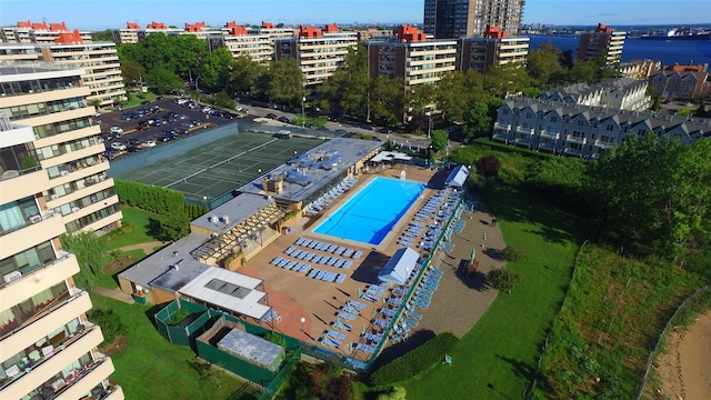 birds eye view of property with a view of city