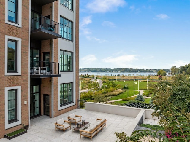 view of patio / terrace with a water view