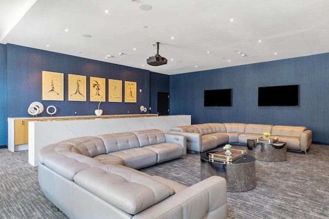 carpeted living area with recessed lighting