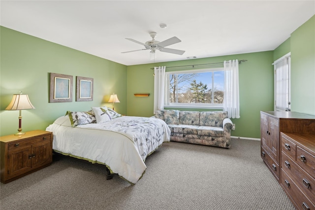 bedroom with baseboards, carpet floors, and ceiling fan