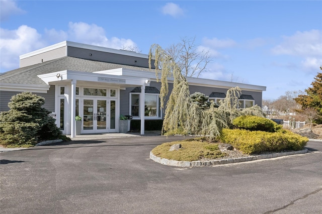 view of property featuring driveway