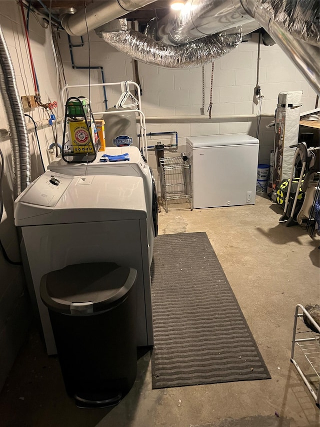 clothes washing area featuring laundry area and independent washer and dryer