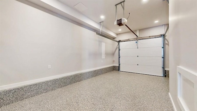 garage with recessed lighting, a garage door opener, and baseboards