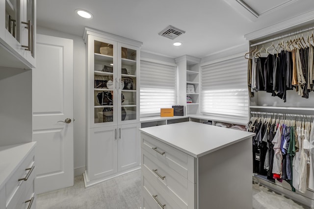 walk in closet with visible vents