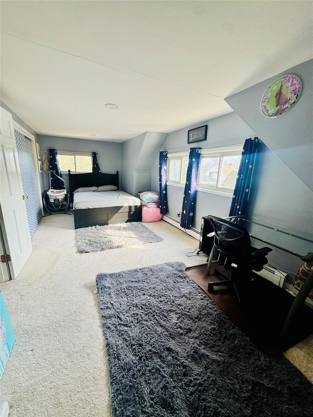 carpeted bedroom with a baseboard radiator