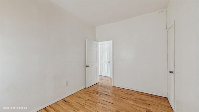 unfurnished room featuring wood finished floors