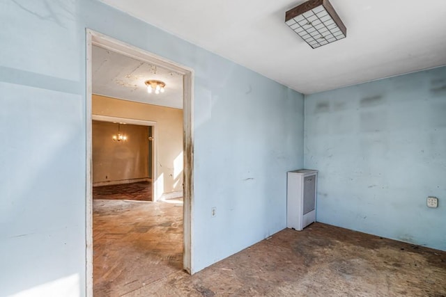 empty room featuring unfinished concrete flooring