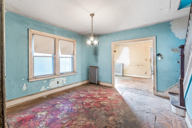 unfurnished dining area featuring stairway, radiator heating unit, and baseboards