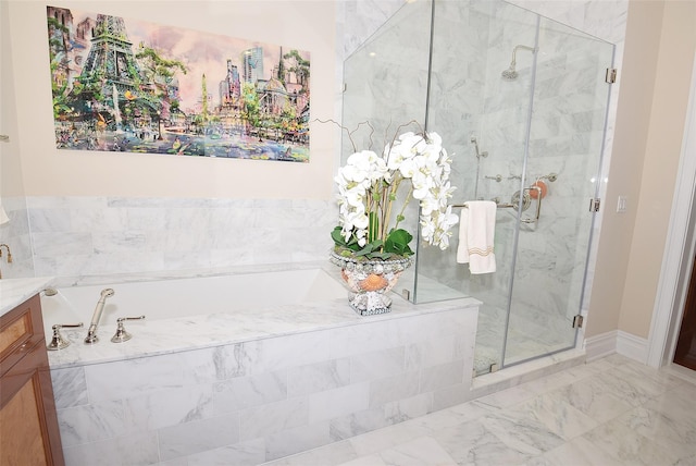 full bath with vanity, a garden tub, marble finish floor, and a marble finish shower
