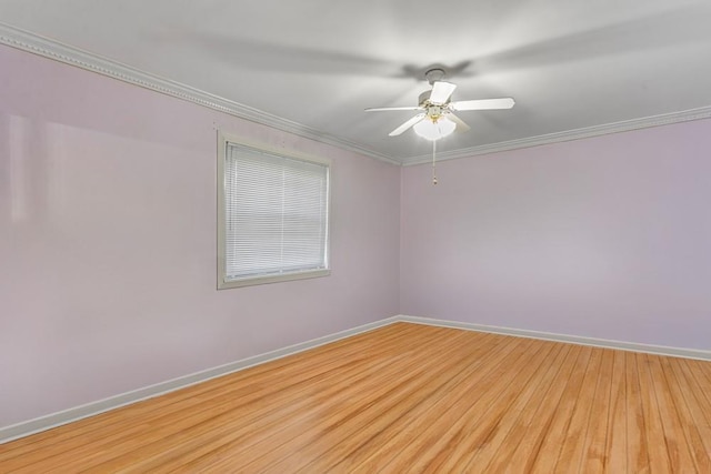 empty room with baseboards, a ceiling fan, crown molding, and light wood finished floors