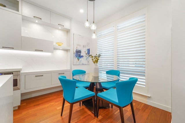 dining room featuring light wood-style flooring