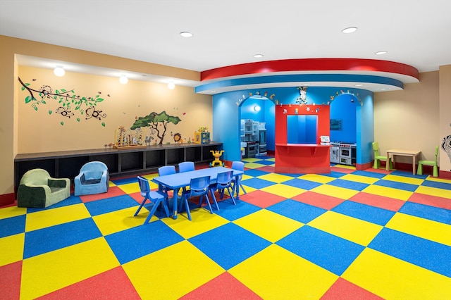 playroom with recessed lighting and carpet floors