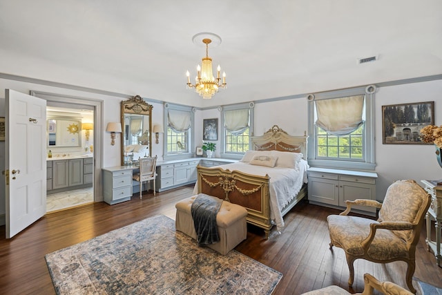 bedroom with multiple windows, visible vents, wood-type flooring, and a chandelier