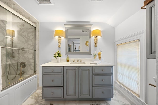 full bath with vanity, visible vents, enclosed tub / shower combo, vaulted ceiling, and marble finish floor