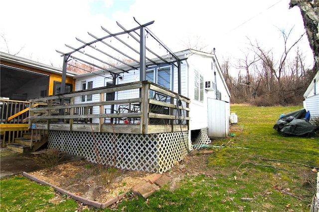 exterior space featuring a yard and a wooden deck