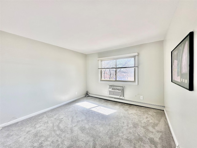 empty room featuring carpet flooring, baseboards, and baseboard heating