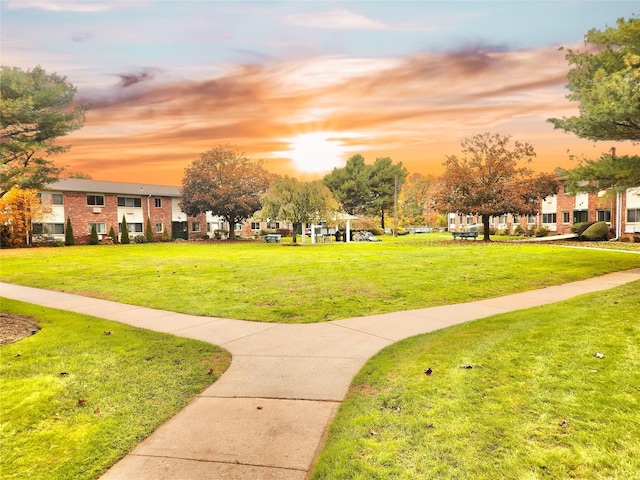 view of community featuring a lawn