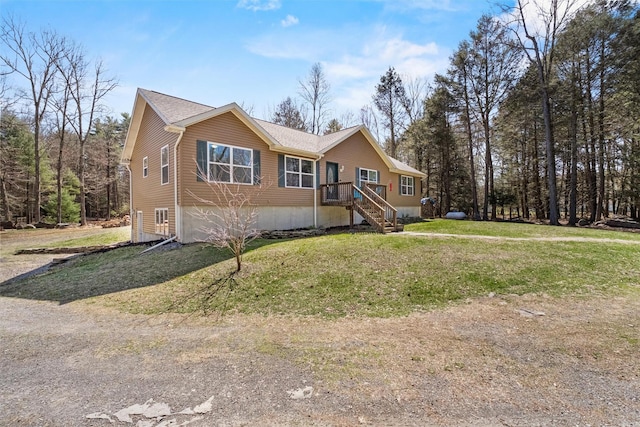 ranch-style home with a front lawn