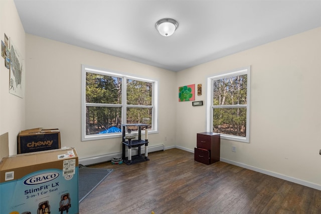 interior space with baseboards and dark wood-type flooring