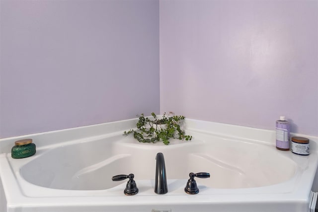 bathroom featuring a bath