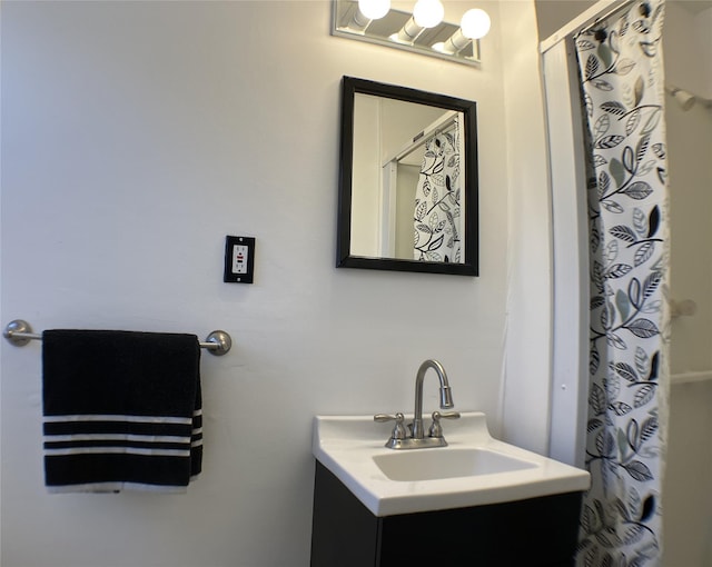 bathroom with vanity and a shower with curtain