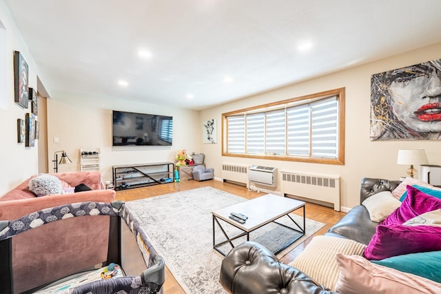 3125 Spencer Dr, Bronx, NY 10465 - living room with radiator, wood finished floors, and recessed lighting