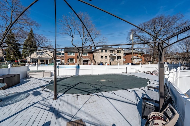 3125 Spencer Dr, Bronx, NY 10465 - view of swimming pool featuring fence, a wooden deck, a fenced in pool, and a residential view