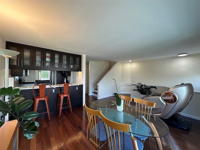 240-54 Oak Park Dr, Douglaston, NY 11362 - dining space with dark wood-type flooring, baseboards, and stairs