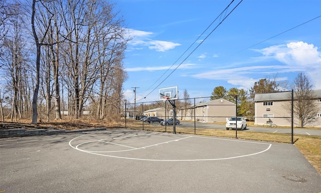 view of sport court with community basketball court and fence