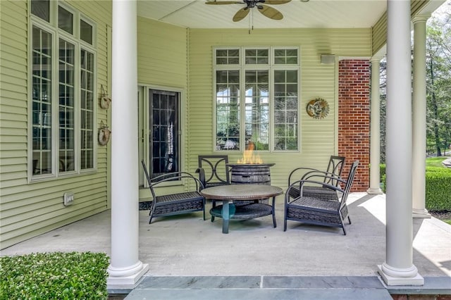 view of patio featuring a porch and a ceiling fan