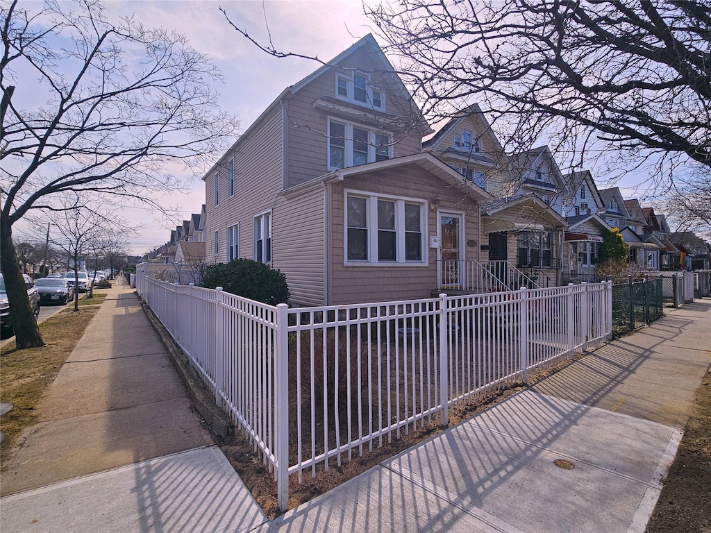 view of front of property with a fenced front yard