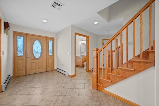 entrance foyer with stairs, recessed lighting, visible vents, and a baseboard radiator