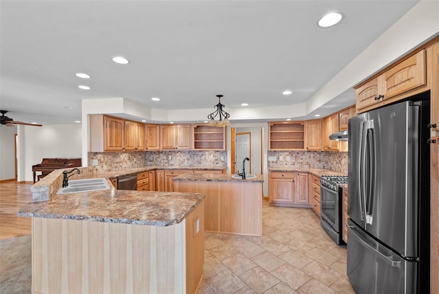 kitchen with a sink, open shelves, a peninsula, and stainless steel appliances