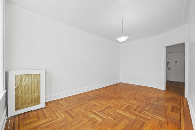 empty room featuring baseboards